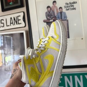 yellow Nike air jordan mids